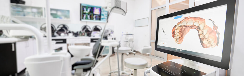 Dental office with 3D dental imaging screen.